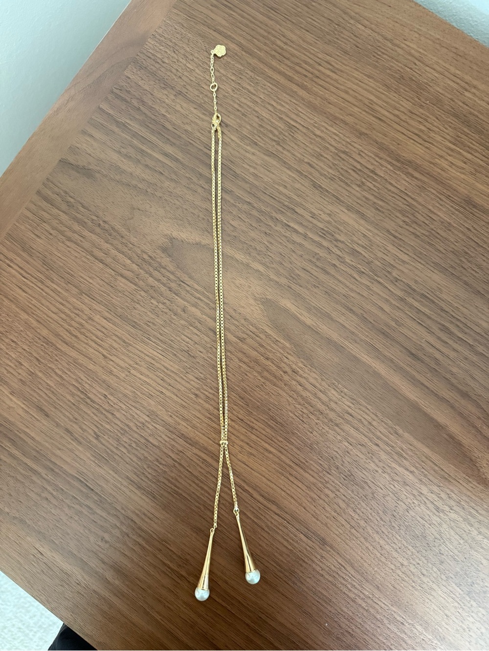 Trina Turk Gold Lariat Style Necklace with Pearl Drops